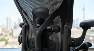 Detailed view of the lumbar and back support mechanism on an office chair designed for pregnancy support.