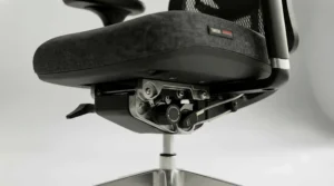 Close-up of the tilt mechanism on a high-performance 24 hour office chair.