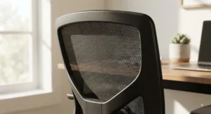 Close-up of high-quality mesh fabric on a breathable desk chair designed for comfort during long work hours.