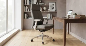 An executive fabric swivel chair with adjustable armrests in a contemporary study.