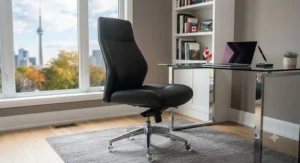 A sleek modern genuine leather desk chair featuring a polished aluminum base and smooth-rolling casters.